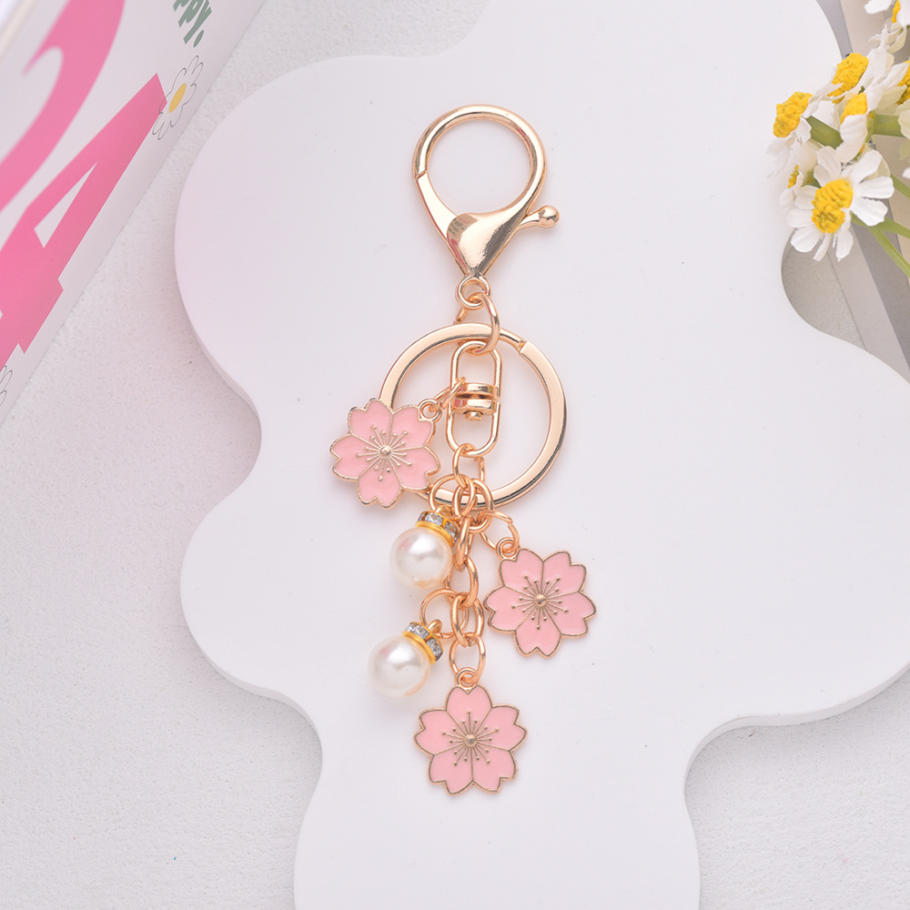 Pearl Keychain Charm Cute Chic - đánh giá và giá Women Bags Ysl